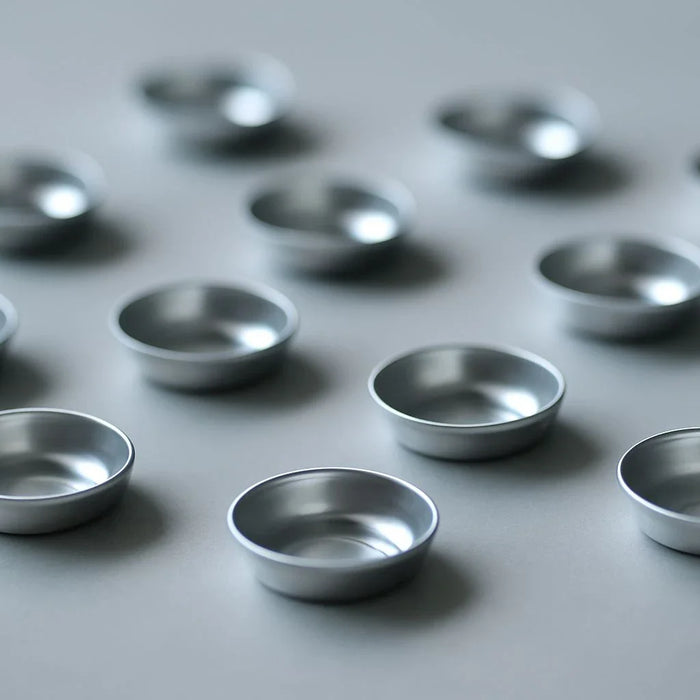 Solutions for common problems with disposable aluminum sample pans in DSC, including contamination, warping, and compatibility issues.
