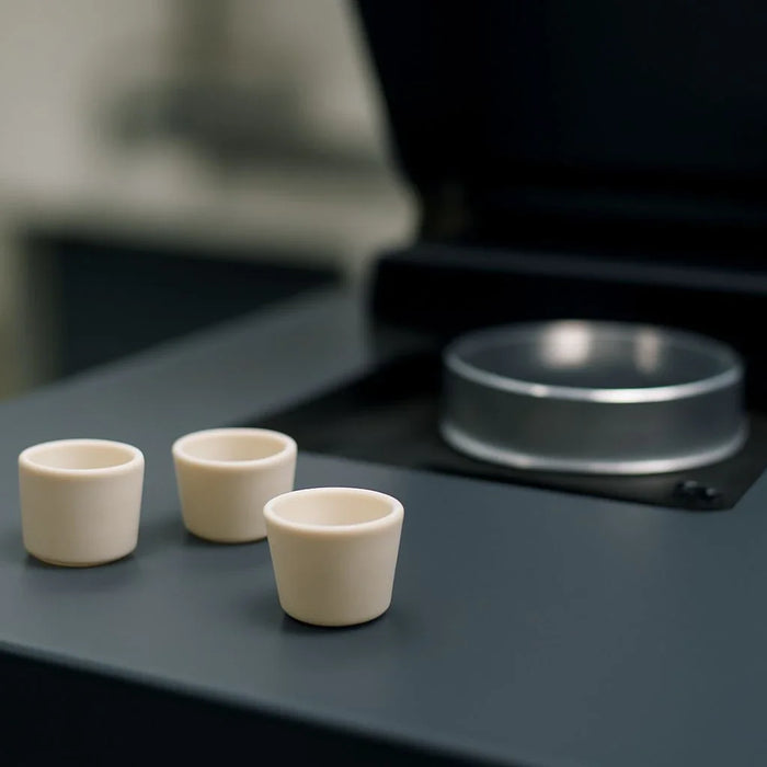 Alumina crucibles used in Differential Scanning Calorimetry (DSC) testing, showcasing their applications and importance across various industries.