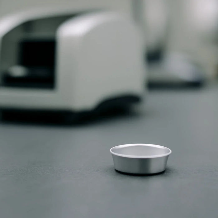 Choosing the right DSC sample pan volume for cost-effective thermal analysis experiments