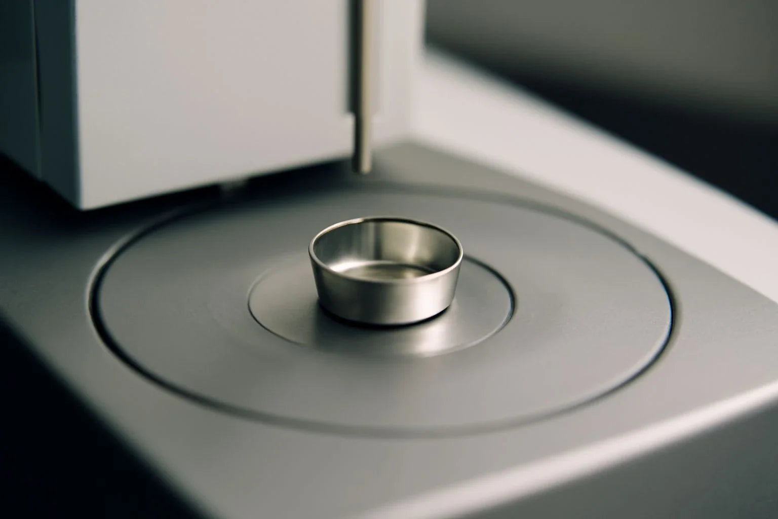 Crucible used in simultaneous DSC-TGA testing setup for accurate thermal analysis.