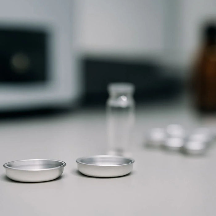 DSC pans for liquid samples used in thermal analysis research across various industries like pharmaceuticals and energy storage.