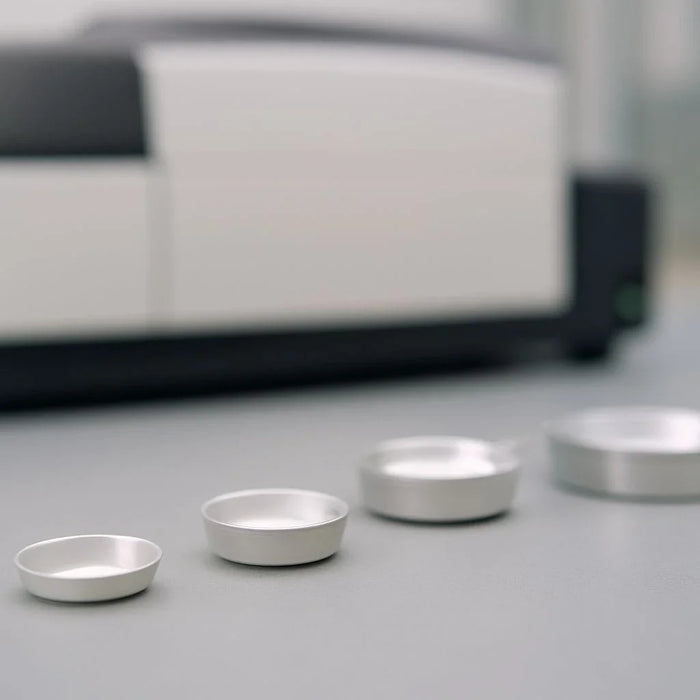 Different volumes of DSC sample pans for accurate thermal analysis