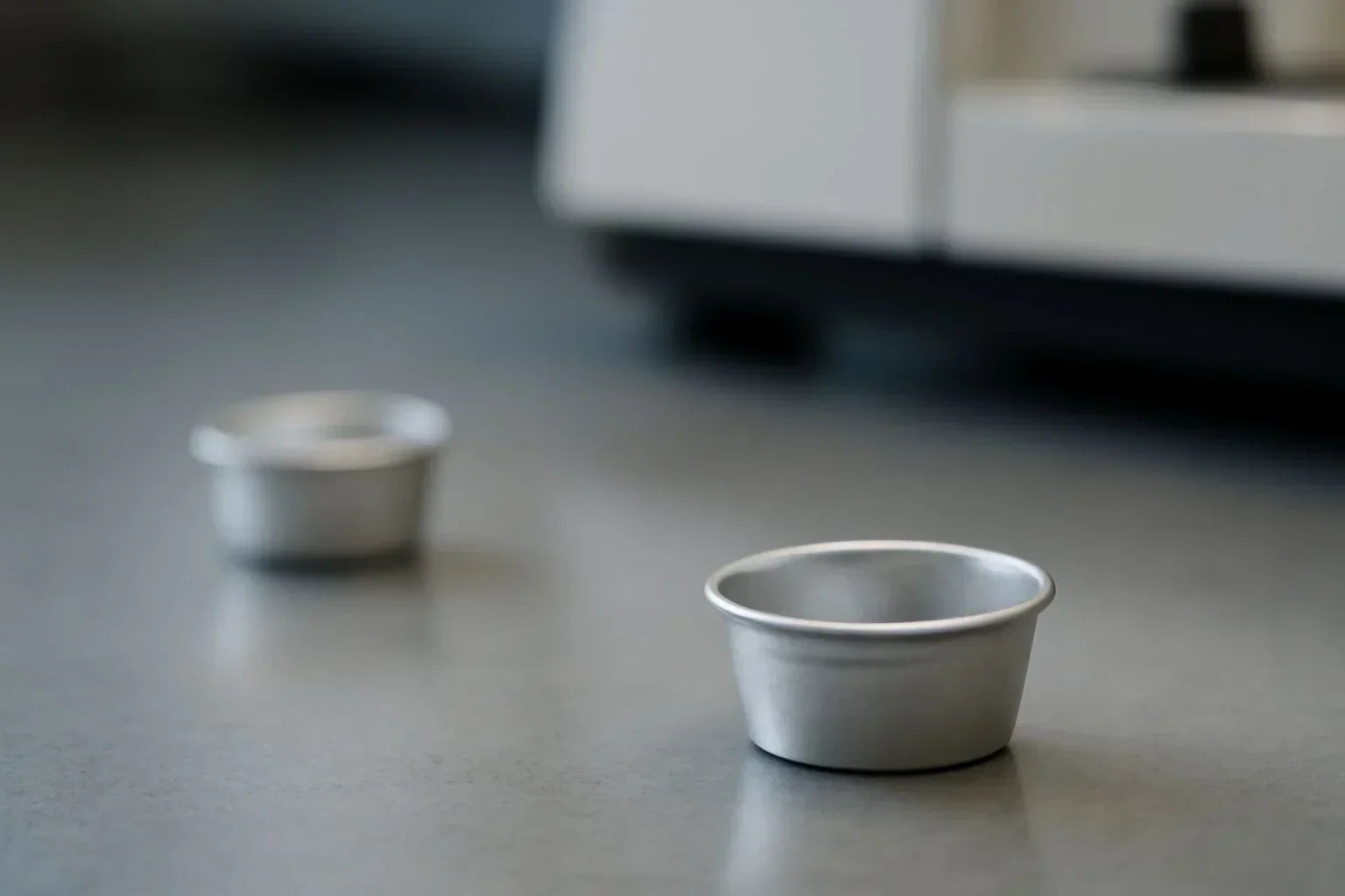 How incorrect DSC sample pan volume affects thermal analysis results, with solutions for optimal pan size selection and improved data accuracy.