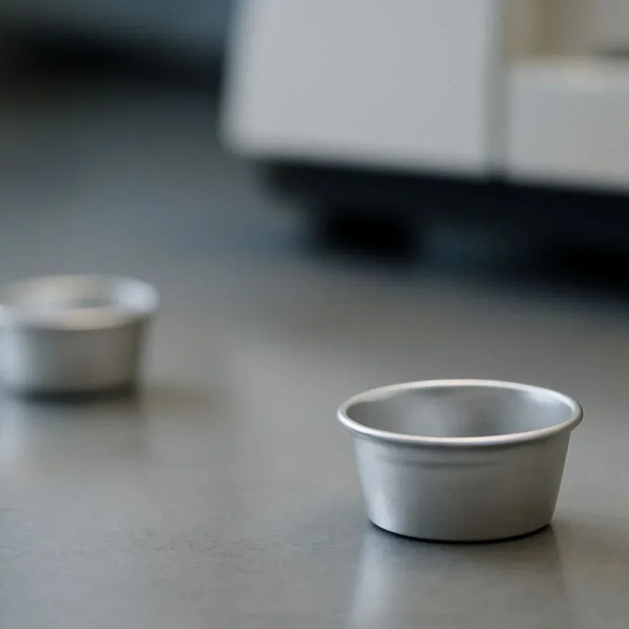 How incorrect DSC sample pan volume affects thermal analysis results, with solutions for optimal pan size selection and improved data accuracy.