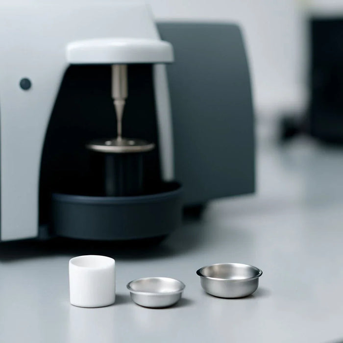 Innovative thermal analysis sample trays designed for high-precision testing in advanced industries.