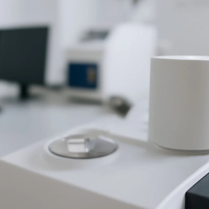 Thermal analysis equipment in a controlled laboratory environment, emphasizing the importance of proper sample preparation and calibration for accurate results.