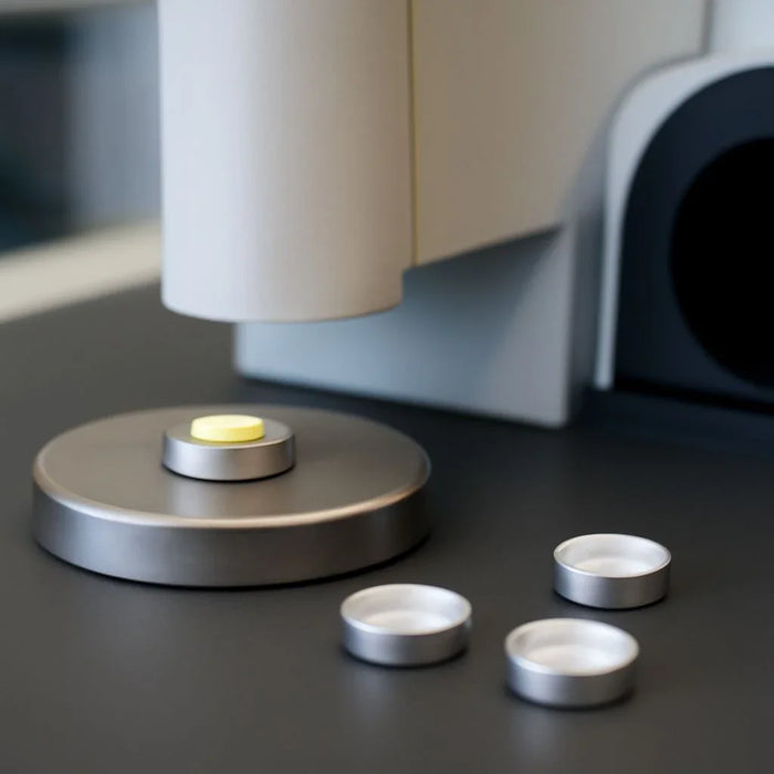 Understanding the impact of DSC sample pan volume on thermal analysis accuracy and heat transfer